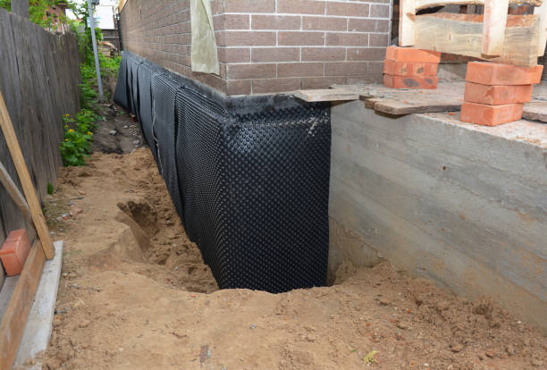 Happy homeowners after waterproofing job in Mount Arlington